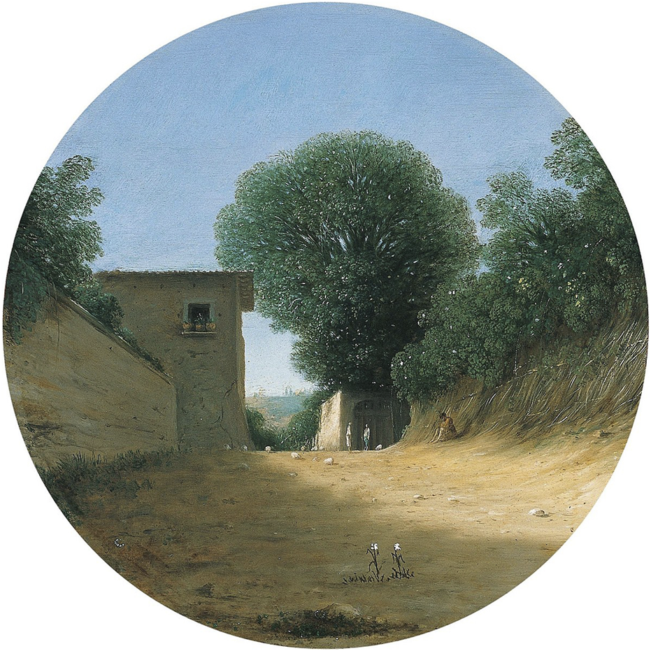 A circular painting depicts a sunlit dirt pathway bordered by high walls and lush green shrubs. A large tree towers over the walls. A distant figure is visible near an archway along the path. A small building with a window is on the left. The scene conveys a tranquil, rural atmosphere under a clear blue sky.