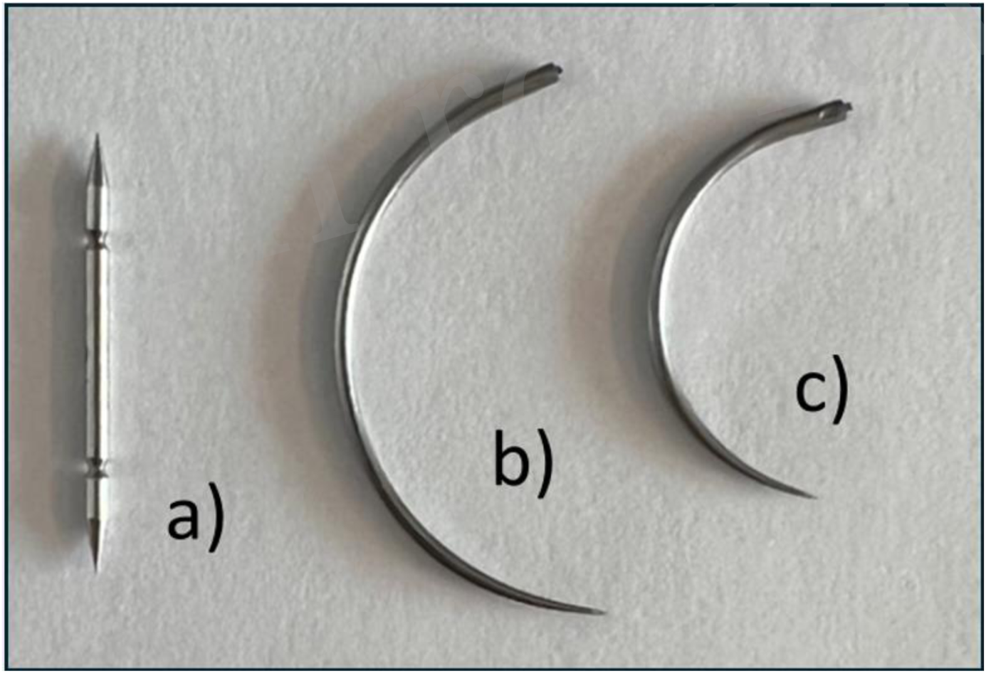 Three different types of surgical needles are displayed. Needle a) is straight and pointed. Needle b) is a larger curved needle. Needle c) is a smaller curved needle.